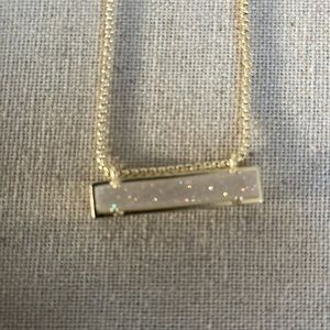 Kendra Scott necklace gold with white bar sparkly stone